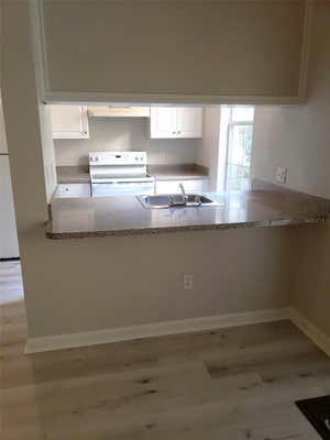 860 N ORANGE AVE APT 168, ORLANDO, FL 32801, photo 4 of 25