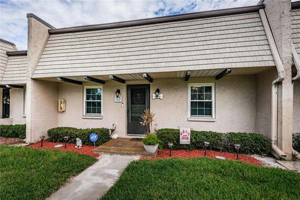 8605 BARDMOOR BLVD APT 107A, SEMINOLE, FL 33777 - Image 1