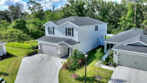 2108 GOLDEN BEAK DR, EAGLE LAKE, FL 33839, photo 4 of 58