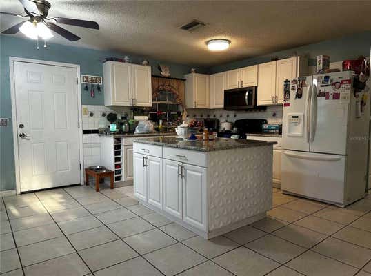 705 S CASTLE CT, TAMPA, FL 33612, photo 3 of 7