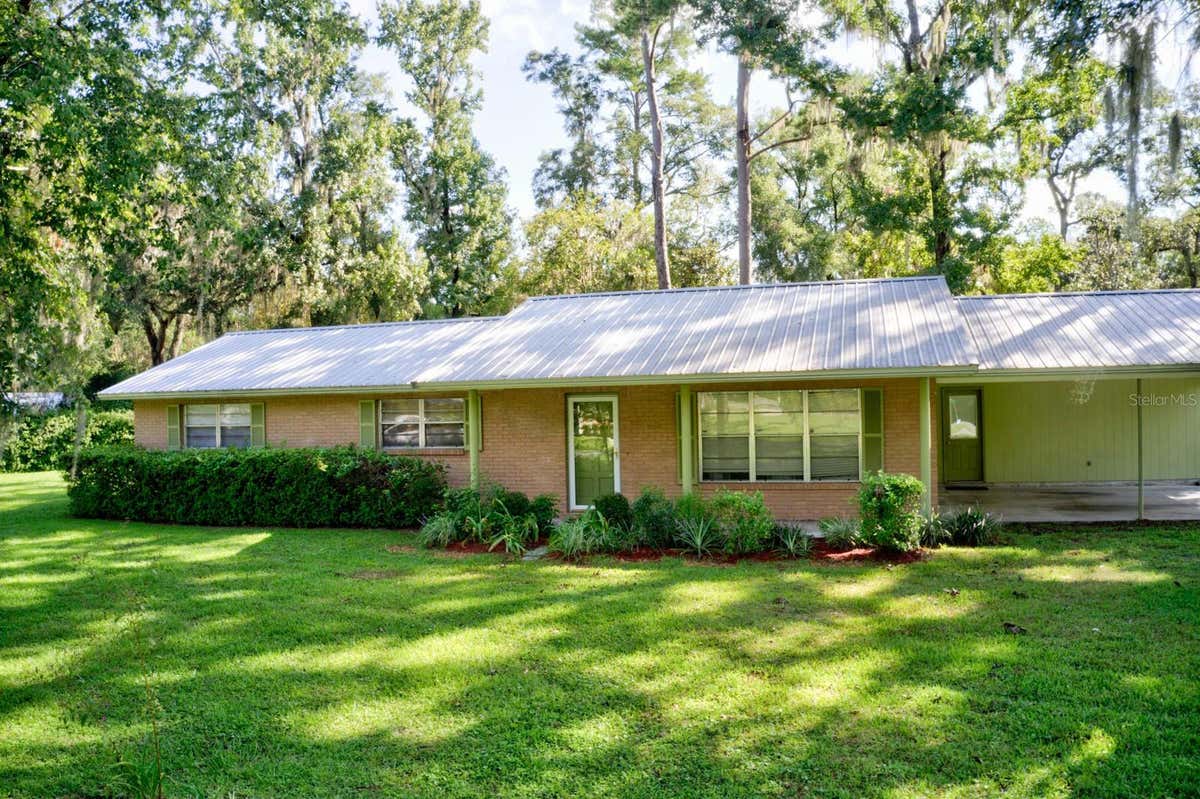 393 SE WOODHAVEN ST, LAKE CITY, FL 32025, photo 1 of 26