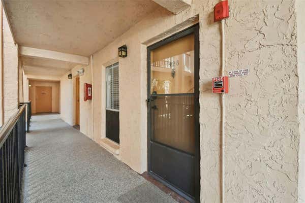 8901 BLIND PASS RD APT 228, ST PETE BEACH, FL 33706, photo 2 of 38