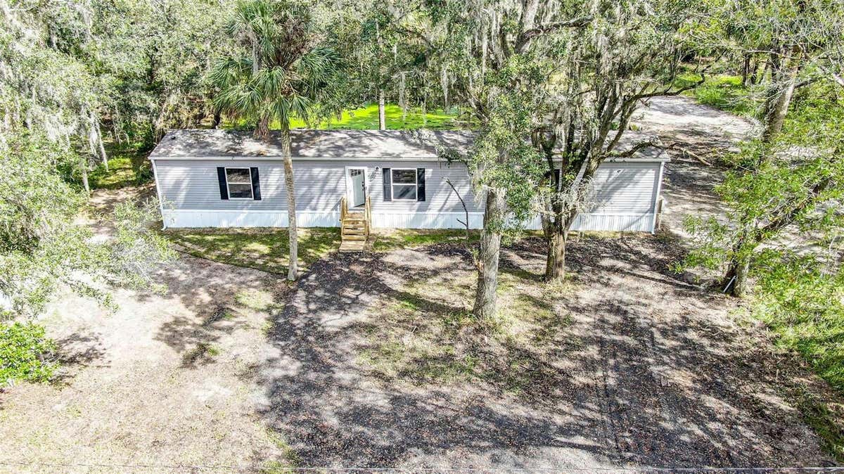 1047 COCONUT BLVD, BUNNELL, FL 32110, photo 1 of 34