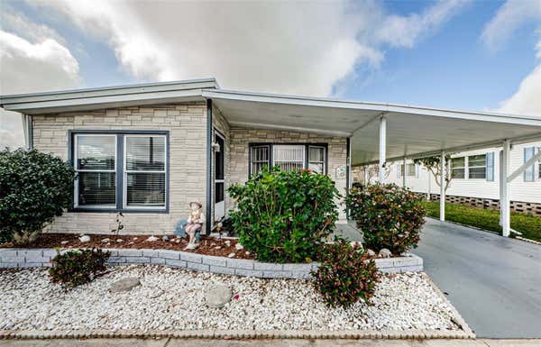 719 SUGAR PALM ST, LARGO, FL 33778, photo 1 of 49