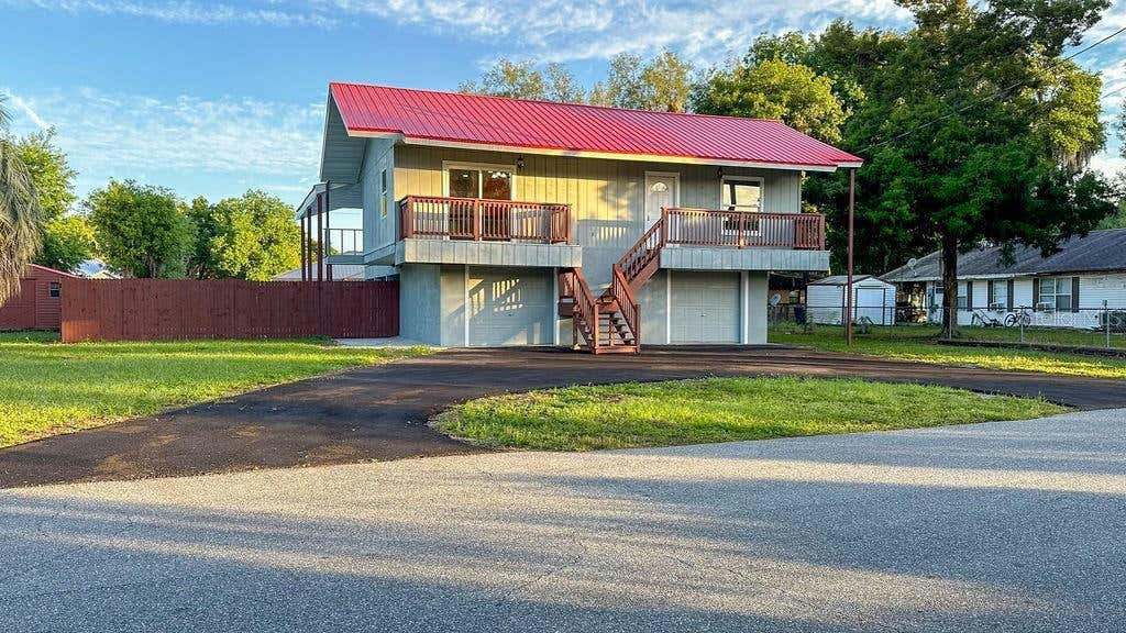 1118 CR 440, LAKE PANASOFFKEE, FL 33538, photo 1 of 32