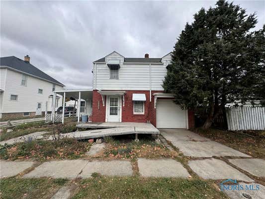 216 W JACKSON ST, FOSTORIA, OH 44830 - Image 1