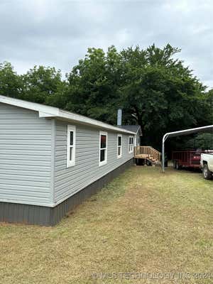 207 W 24TH ST, TISHOMINGO, OK 73460, photo 2 of 26