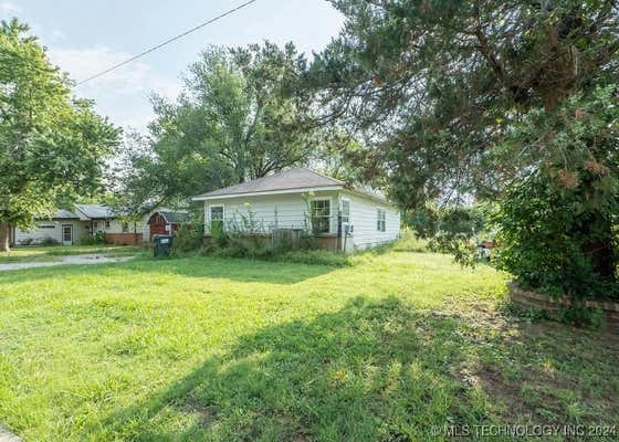 1127 S RUSSELL ST, SKIATOOK, OK 74070, photo 4 of 13