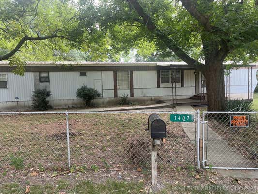 1407 N BRYAN ST, OKMULGEE, OK 74447 - Image 1