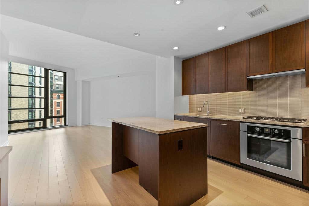 580 WASHINGTON ST UNIT 8E, BOSTON, MA 02111, photo 1 of 24