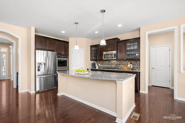 5332 CEDAR DR, NAPERVILLE, IL 60564, photo 2 of 56