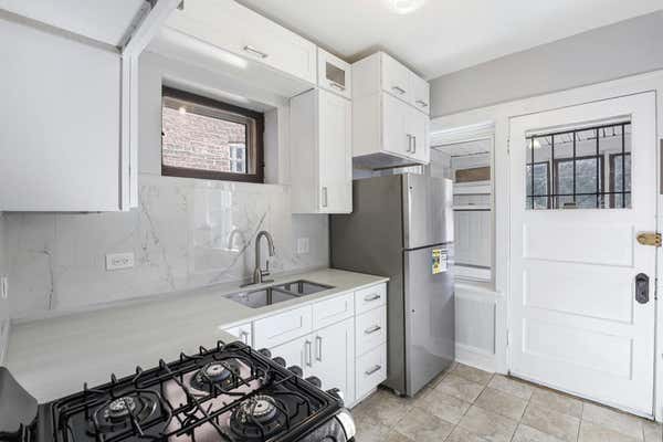 11243 S VERNON AVE, CHICAGO, IL 60628, photo 4 of 31