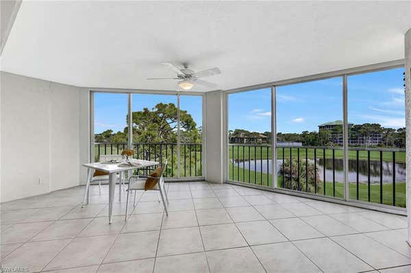 26920 WEDGEWOOD DR APT 402, BONITA SPRINGS, FL 34134 - Image 1