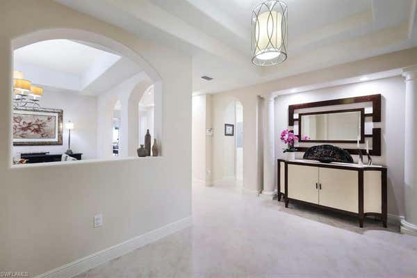 571 AVELLINO ISLES CIR # 102, NAPLES, FL 34119 - Image 1