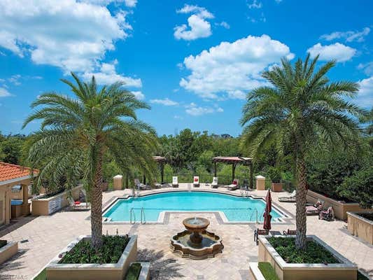 7425 PELICAN BAY BLVD APT 201, NAPLES, FL 34108 - Image 1