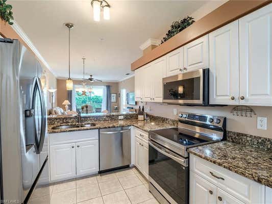 8680 CEDAR HAMMOCK CIR APT 143, NAPLES, FL 34112 - Image 1