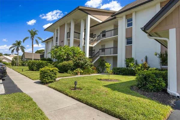 1510 IMPERIAL GOLF COURSE BLVD APT 114, NAPLES, FL 34110 - Image 1