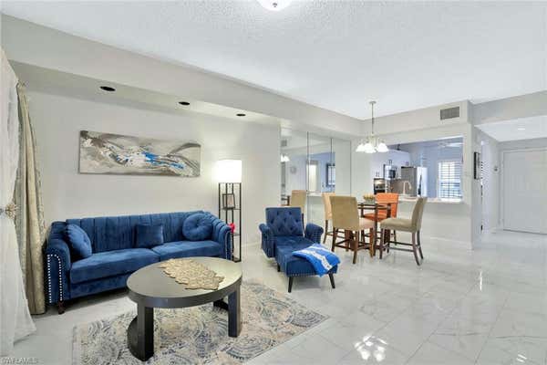 1018 WOODSHIRE LN APT A210, NAPLES, FL 34105 - Image 1