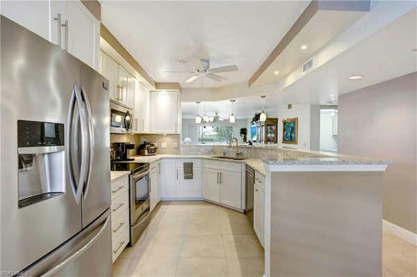 360 HORSE CREEK DR APT 101, NAPLES, FL 34110 - Image 1