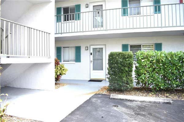 5683 RATTLESNAKE HAMMOCK RD APT 102A, NAPLES, FL 34113 - Image 1