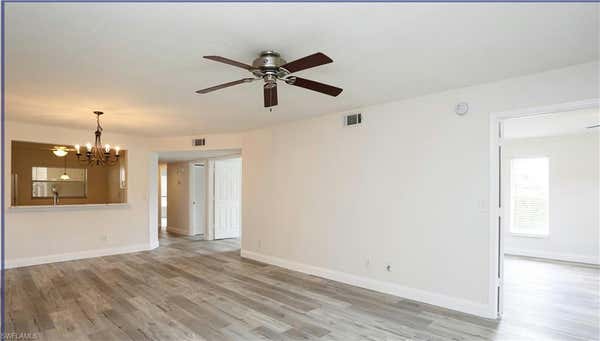 717 LANDOVER CIR APT 101, NAPLES, FL 34104 - Image 1