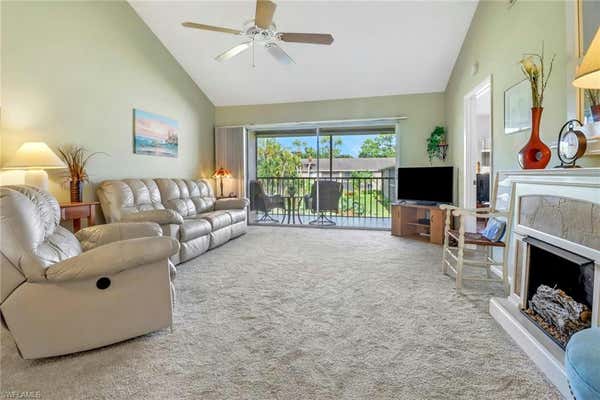 5697 RATTLESNAKE HAMMOCK RD APT 203C, NAPLES, FL 34113 - Image 1