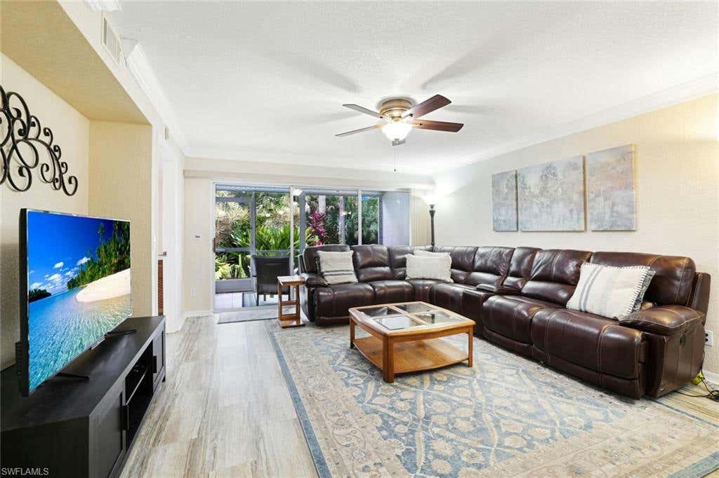 345 GABRIEL CIR APT 5, NAPLES, FL 34104, photo 1 of 28