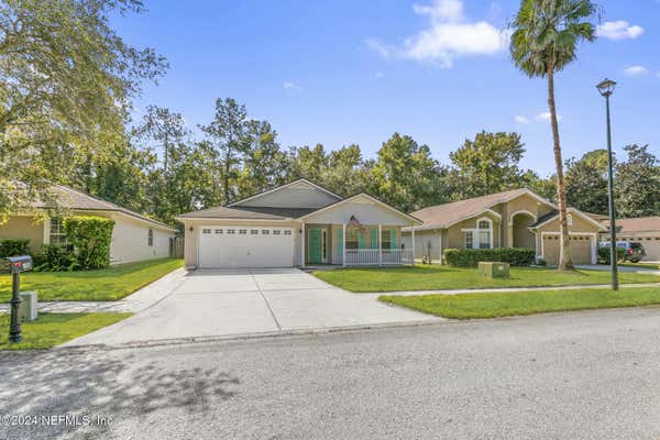 1803 MOSS CREEK DR, FLEMING ISLAND, FL 32003 - Image 1