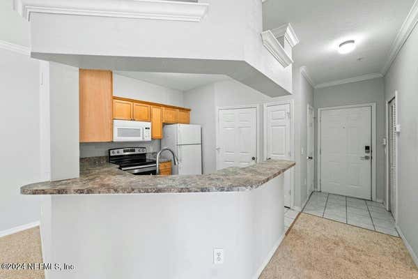 10961 BURNT MILL RD APT 524, JACKSONVILLE, FL 32256 - Image 1