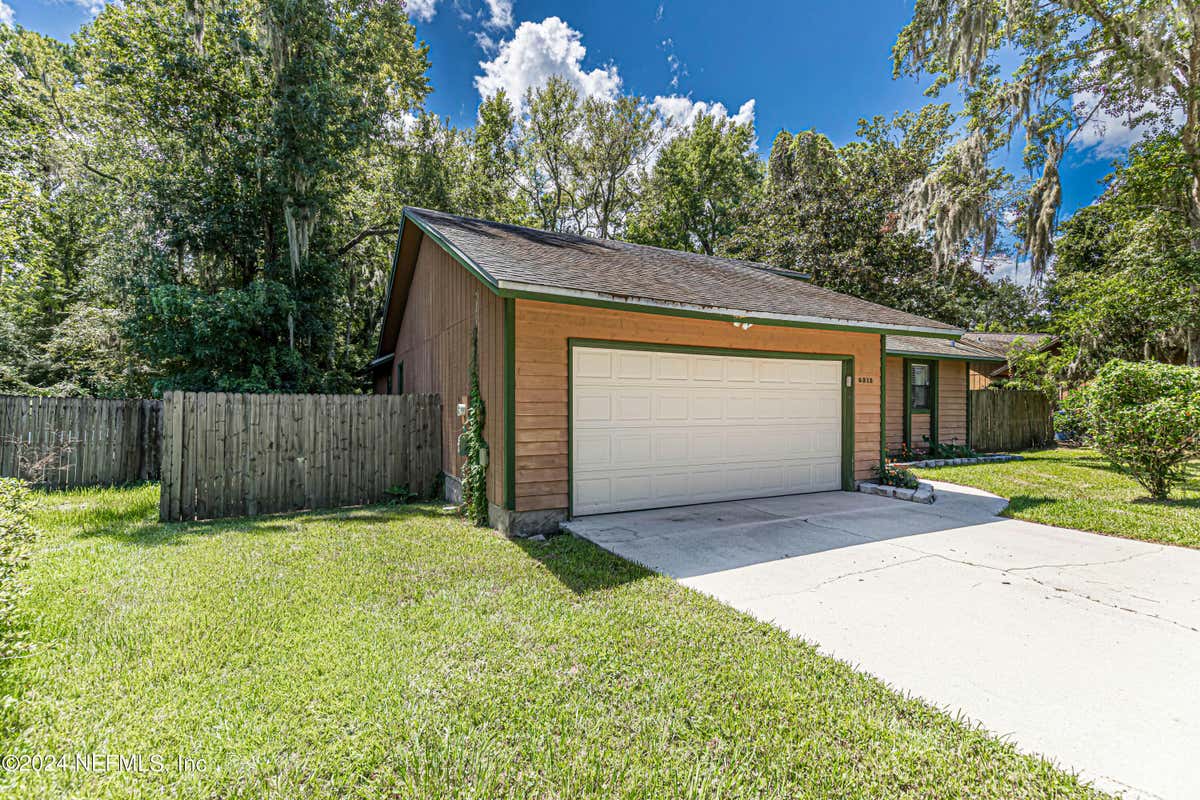 6213 ISLAND FOREST DR, FLEMING ISLAND, FL 32003, photo 1 of 49