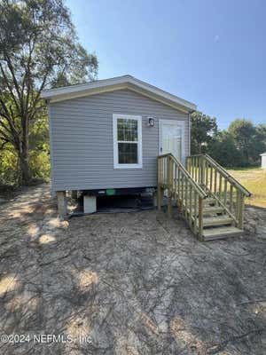 121 POSSUM WALK RD, SATSUMA, FL 32189 - Image 1