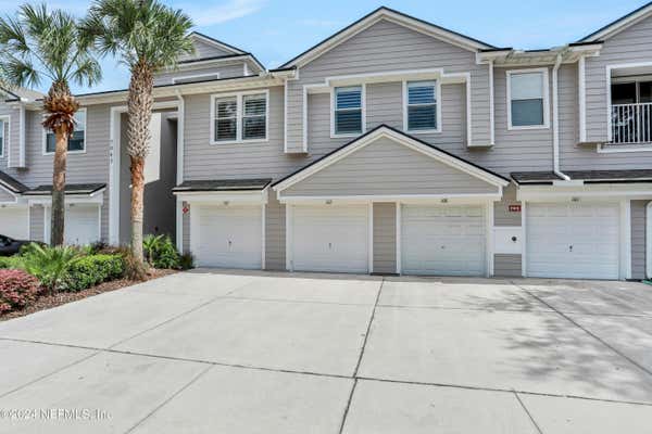 7063 DEER LODGE CIR UNIT 107, JACKSONVILLE, FL 32256 - Image 1