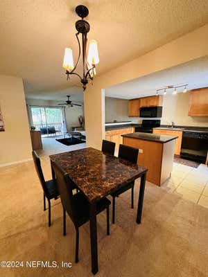 1810 NW 23RD BLVD APT 145, GAINESVILLE, FL 32605 - Image 1