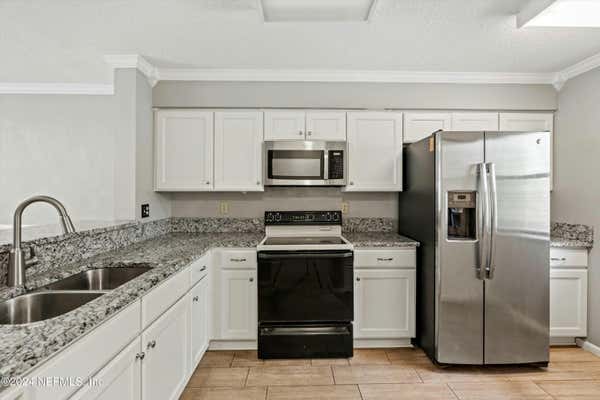 1604 ARCADIA DR UNIT 317, JACKSONVILLE, FL 32207 - Image 1