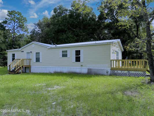 140 BEECHER SPRINGS RD, POMONA PARK, FL 32181 - Image 1