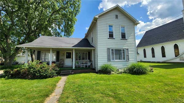 218 W MAIN ST, BEACH CITY, OH 44608 - Image 1