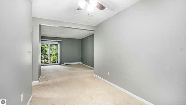 525 GEORGETOWN DR APT 70, TRAVERSE CITY, MI 49684, photo 4 of 28