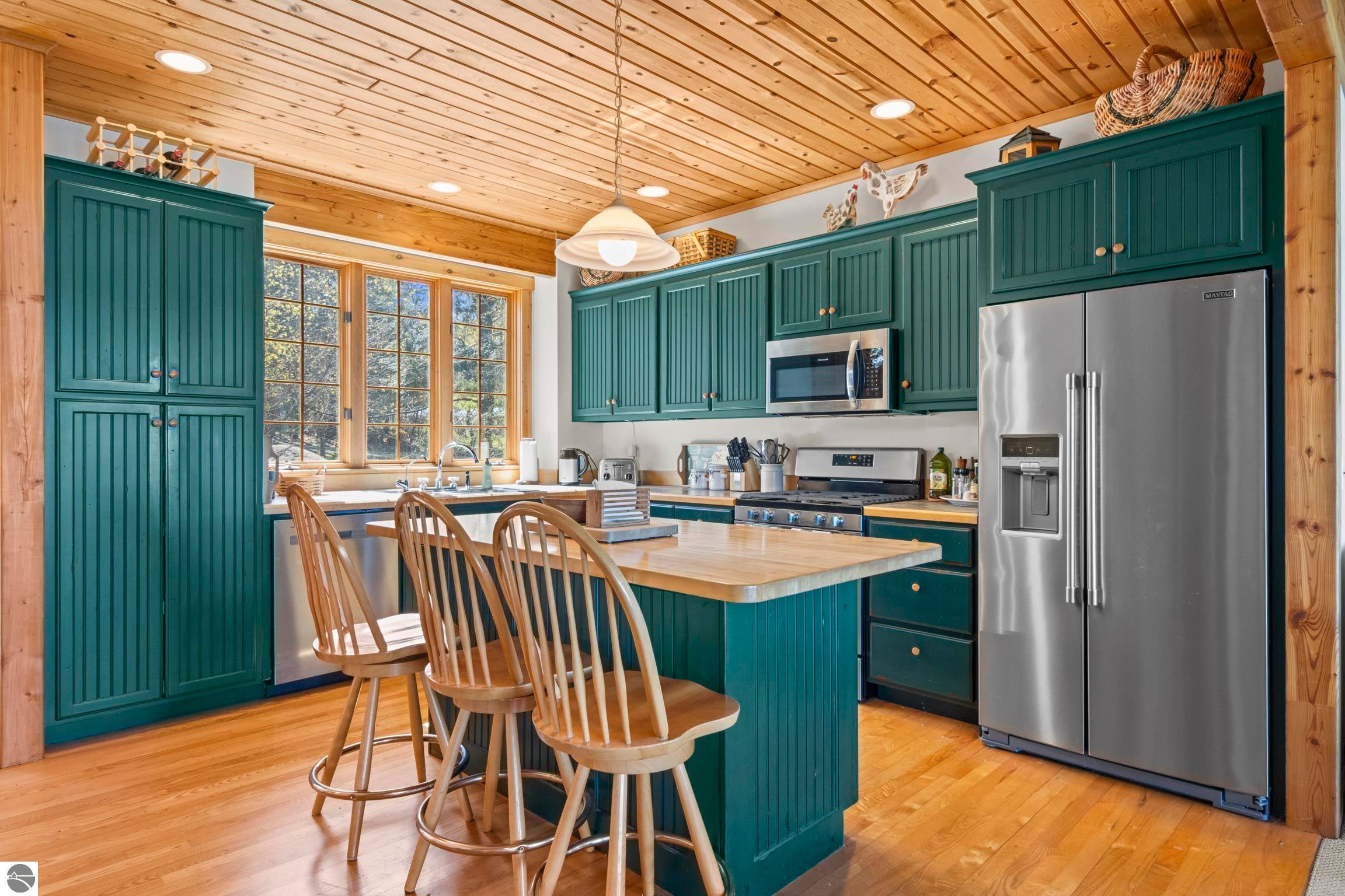 128 OF ELK LAKE FRONTAGE ON DESIRABLE SKEGEMOG POINT. Welcome to your – image 24