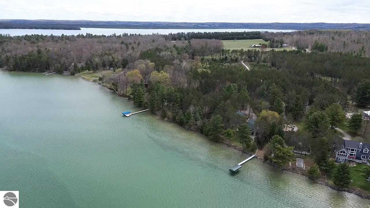 128 OF ELK LAKE FRONTAGE ON DESIRABLE SKEGEMOG POINT. Welcome to your – image 11