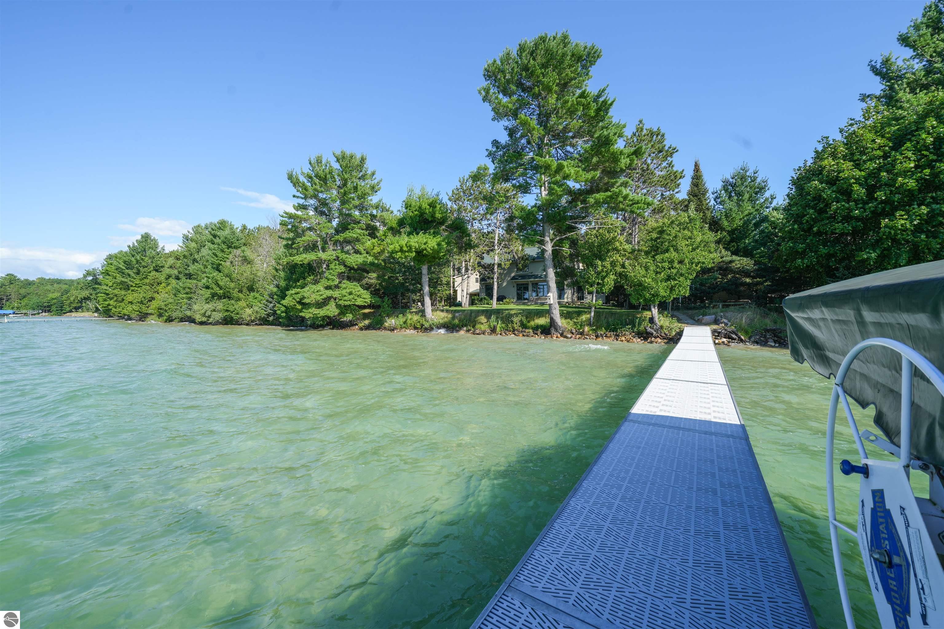 128 OF ELK LAKE FRONTAGE ON DESIRABLE SKEGEMOG POINT. Welcome to your – image 2