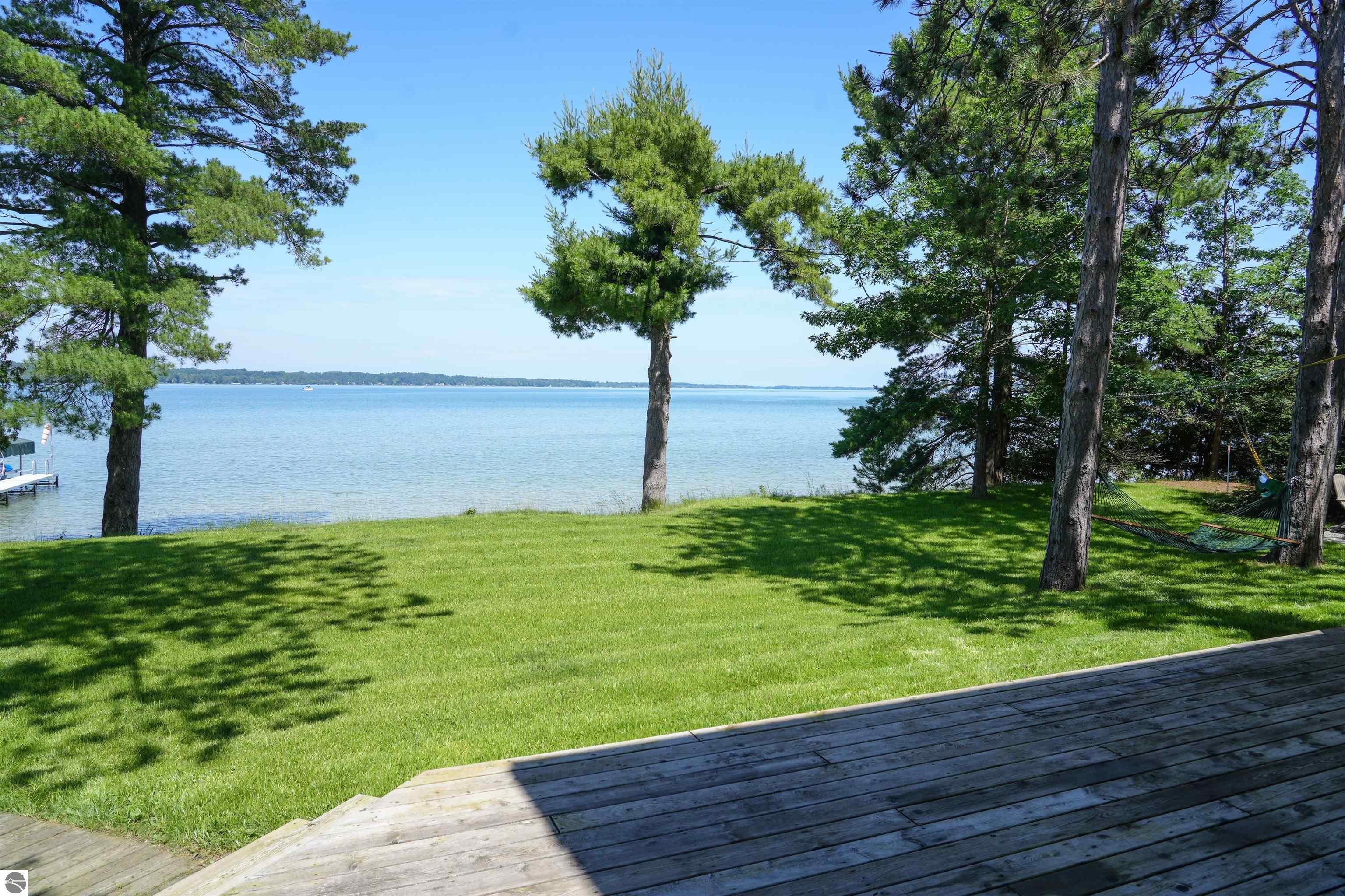 128 OF ELK LAKE FRONTAGE ON DESIRABLE SKEGEMOG POINT. Welcome to your – image 9