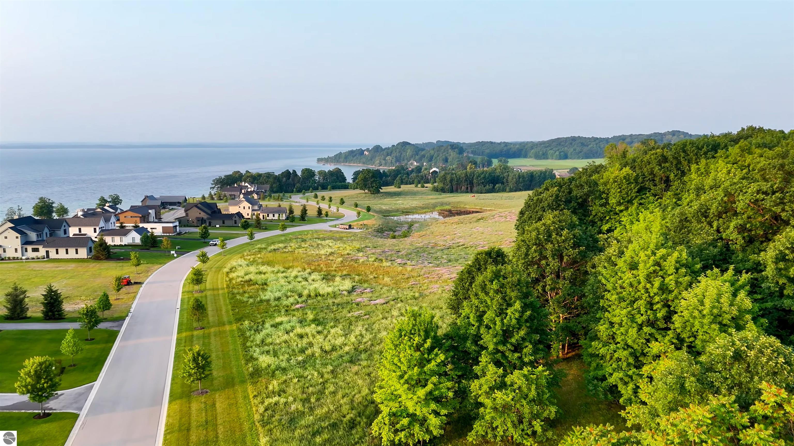 Traverse City, Michigan, 49686, United States, 4 Bedrooms Bedrooms, ,5 BathroomsBathrooms,Residential,Active,1905364