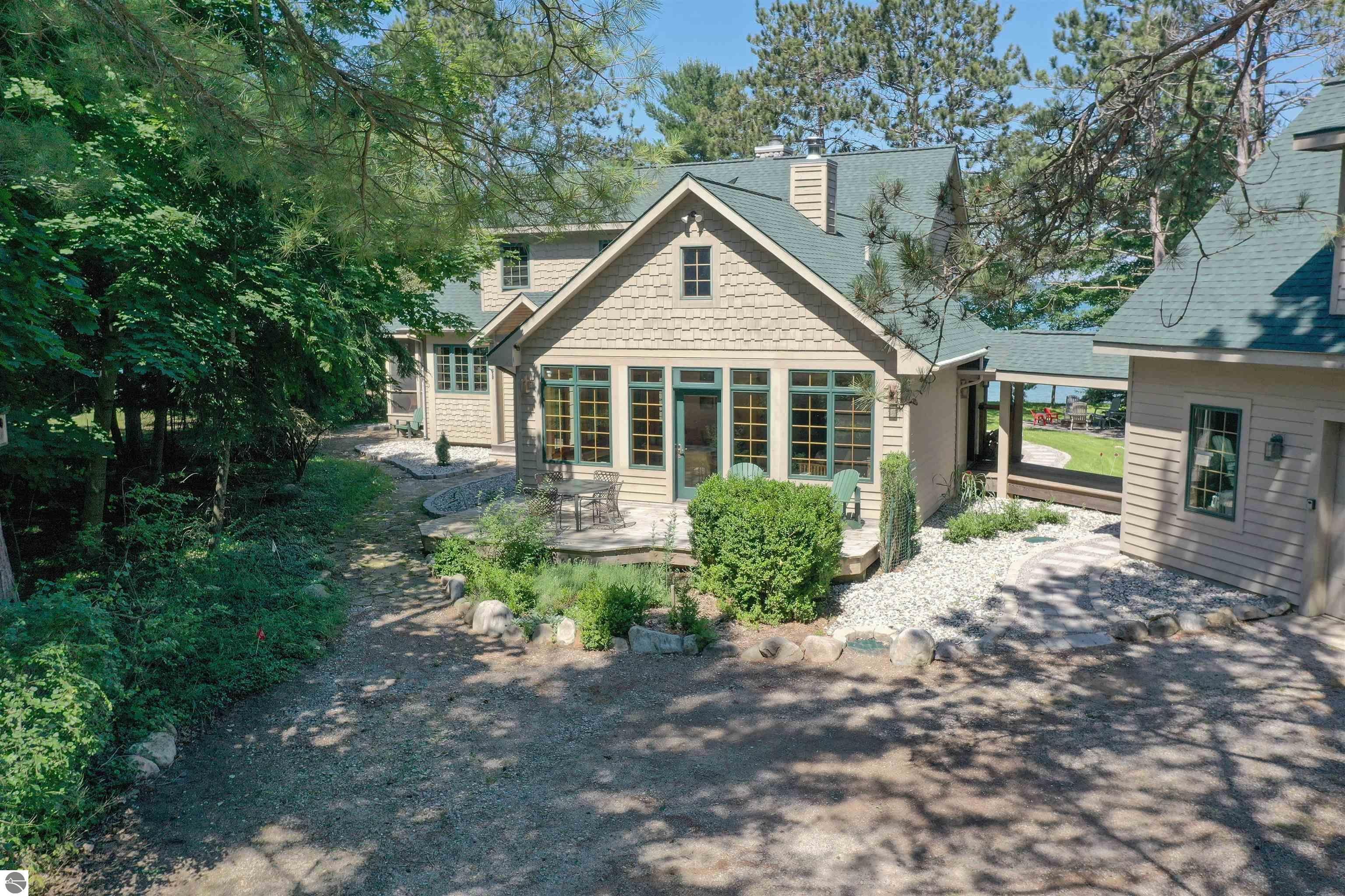 128 OF ELK LAKE FRONTAGE ON DESIRABLE SKEGEMOG POINT. Welcome to your – image 1
