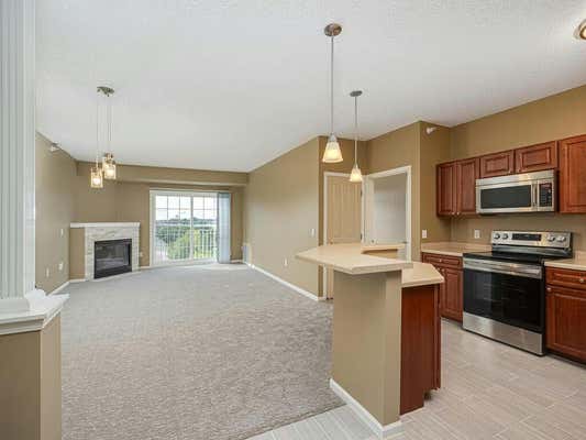 649 OLD HIGHWAY 8 NW APT 325, SAINT PAUL, MN 55112 - Image 1