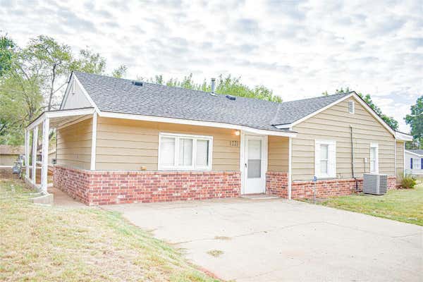 1221 W A AVE, ELK CITY, OK 73644 - Image 1