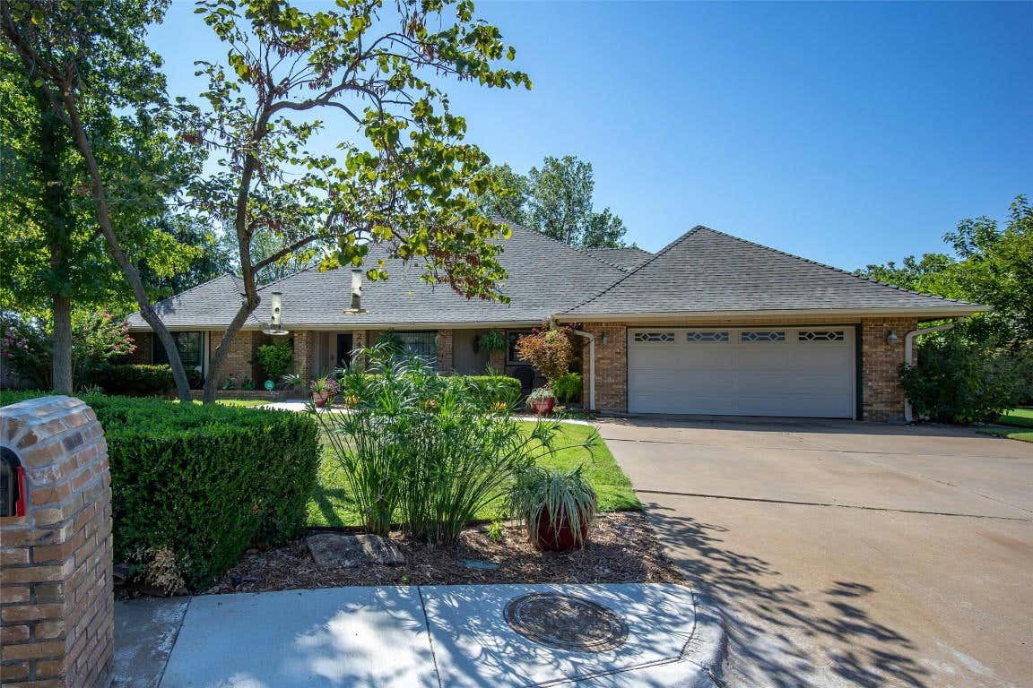 2400 WOODHOLLOW TRL, EDMOND, OK 73012, photo 1 of 43