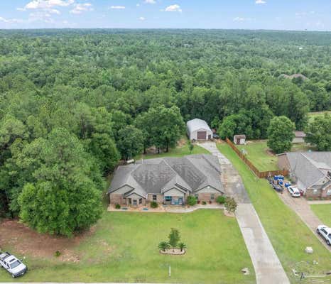 3093 WALLACE LAKE RD, PACE, FL 32571, photo 1 of 66