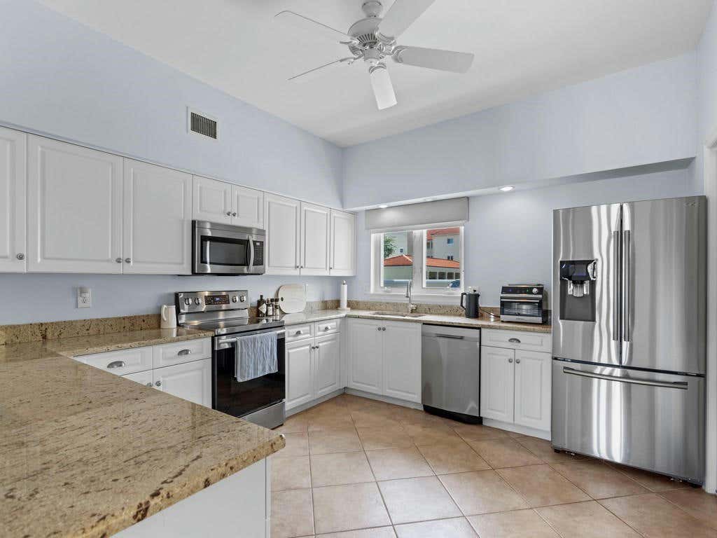 5030 HARMONY CIR APT 104, VERO BEACH, FL 32967, photo 1 of 36