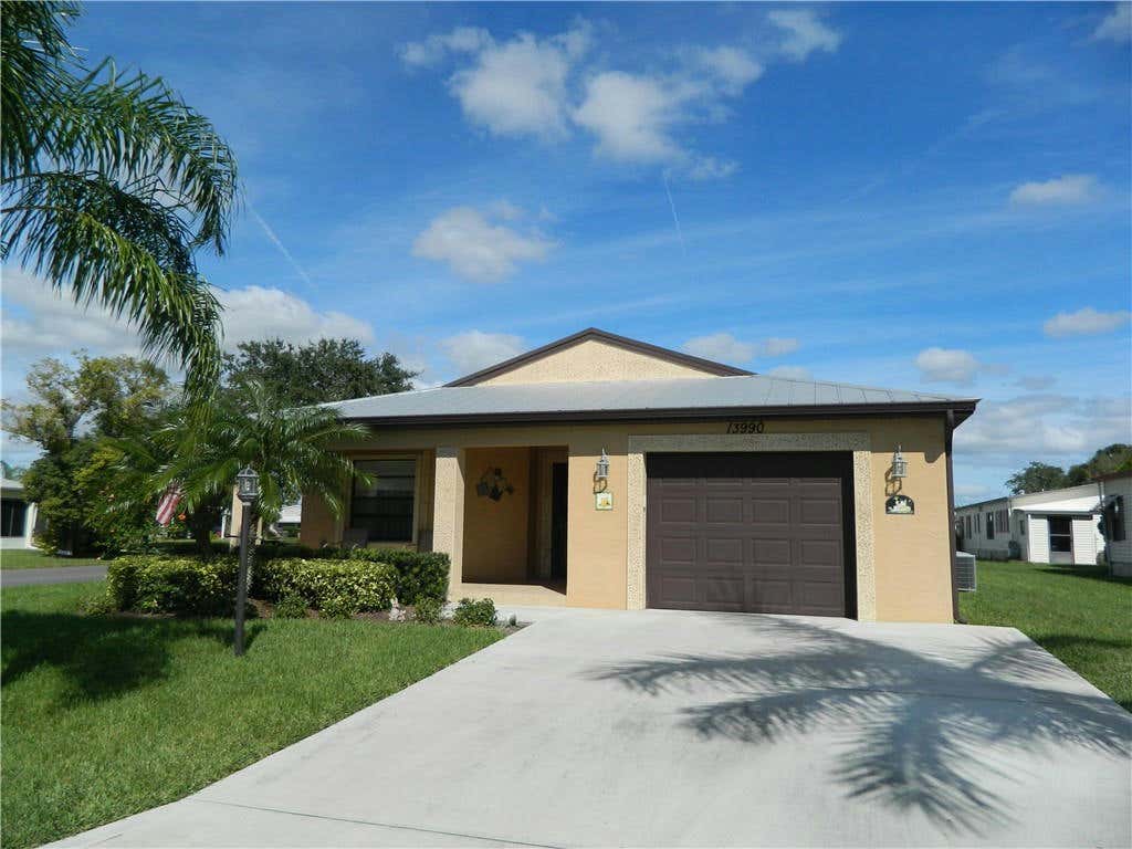 2 JACARANDA LN, PORT ST. LUCIE, FL 34952, photo 1 of 5