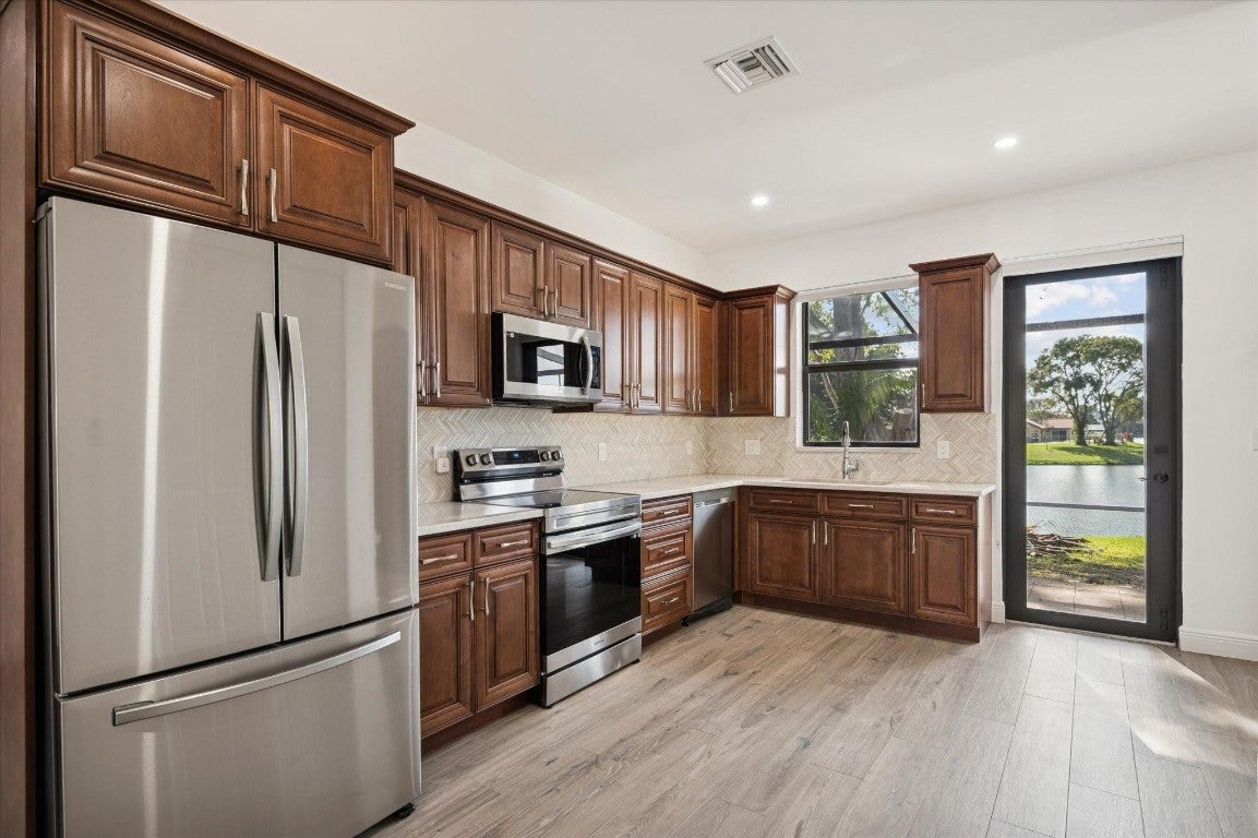 Parkland, Florida, 33067, United States, 7 Bedrooms Bedrooms, ,6 BathroomsBathrooms,Residential,Active,2002358